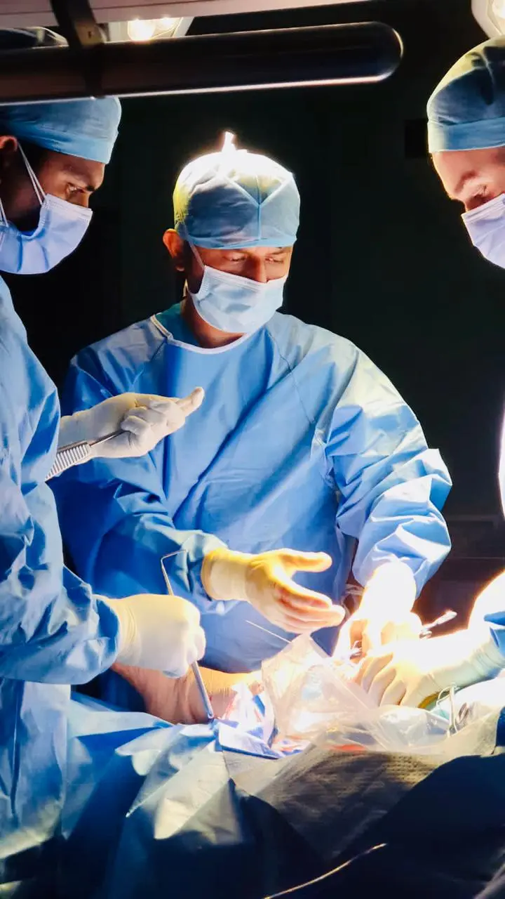 Dr. Dhaval Sagala performing surgery